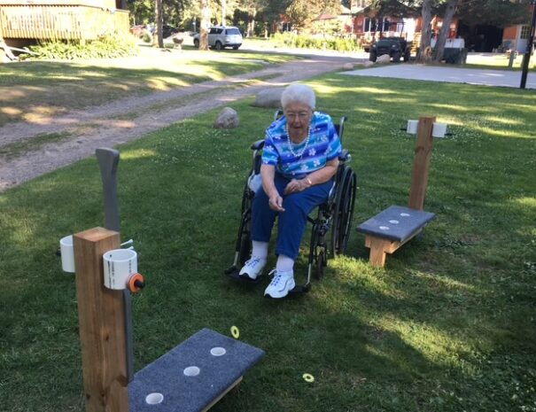 Grandma playing washers